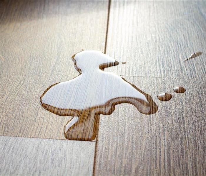 water drops on wood flooring